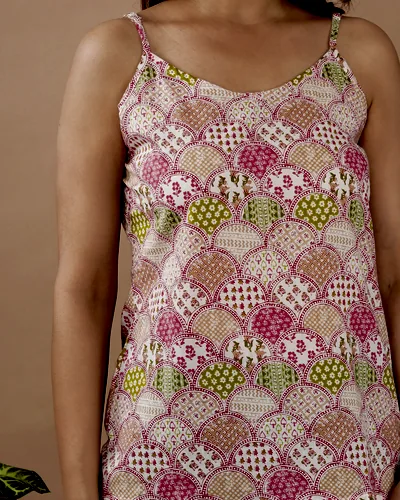 A Bagru-print cotton camisole in rose and olive scallops.