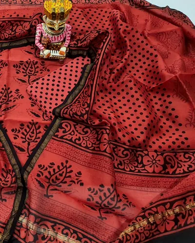 Chanderi cloth in coral, hand-block printed in madder and iron-black.