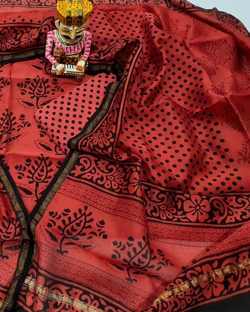 Chanderi cloth in coral, hand-block printed in madder and iron-black.