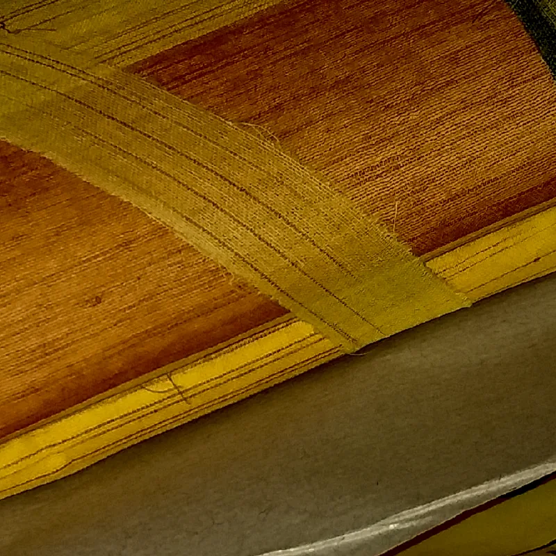 Bengal tant cotton in mustard, a woven gold border running along one edge.